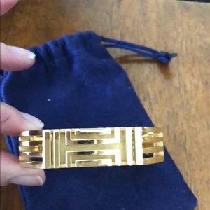 Gold Tory Burch Fitbit bracelet
